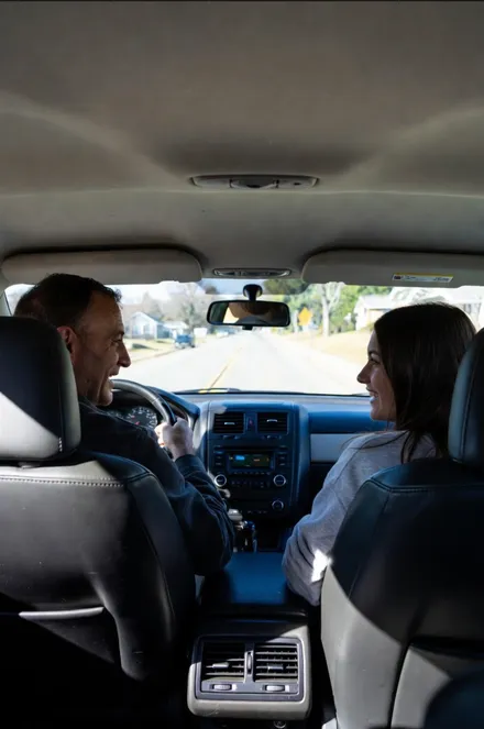 Rides2U driver and passenger